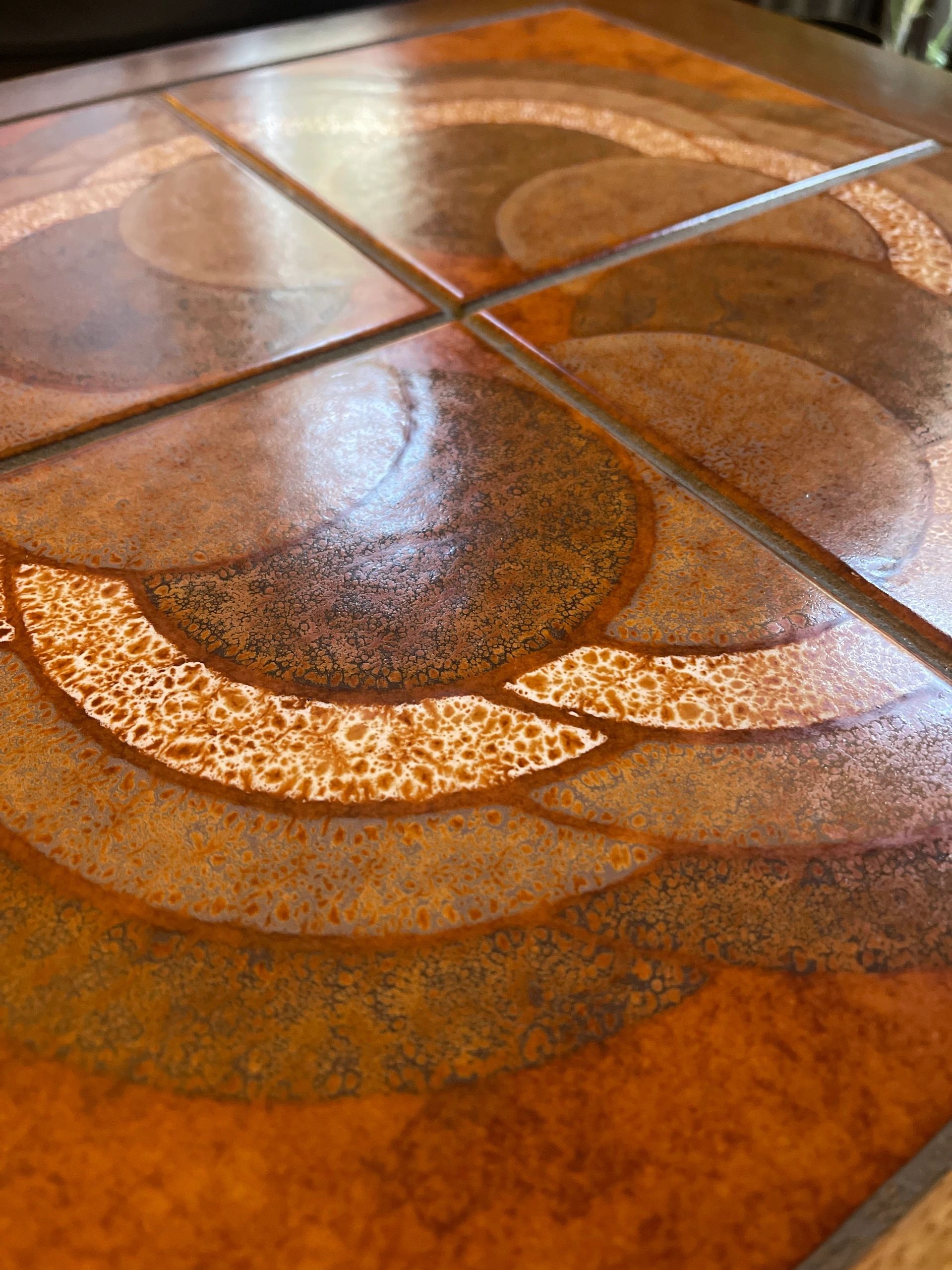 Mid century trio nesting tables with intact tile tops with teak frames and styled legs