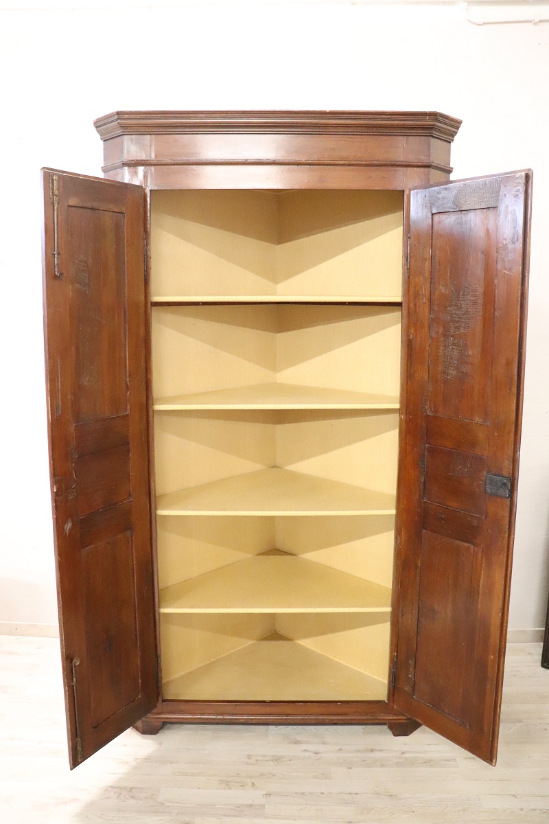 Antique solid walnut corner cabinet