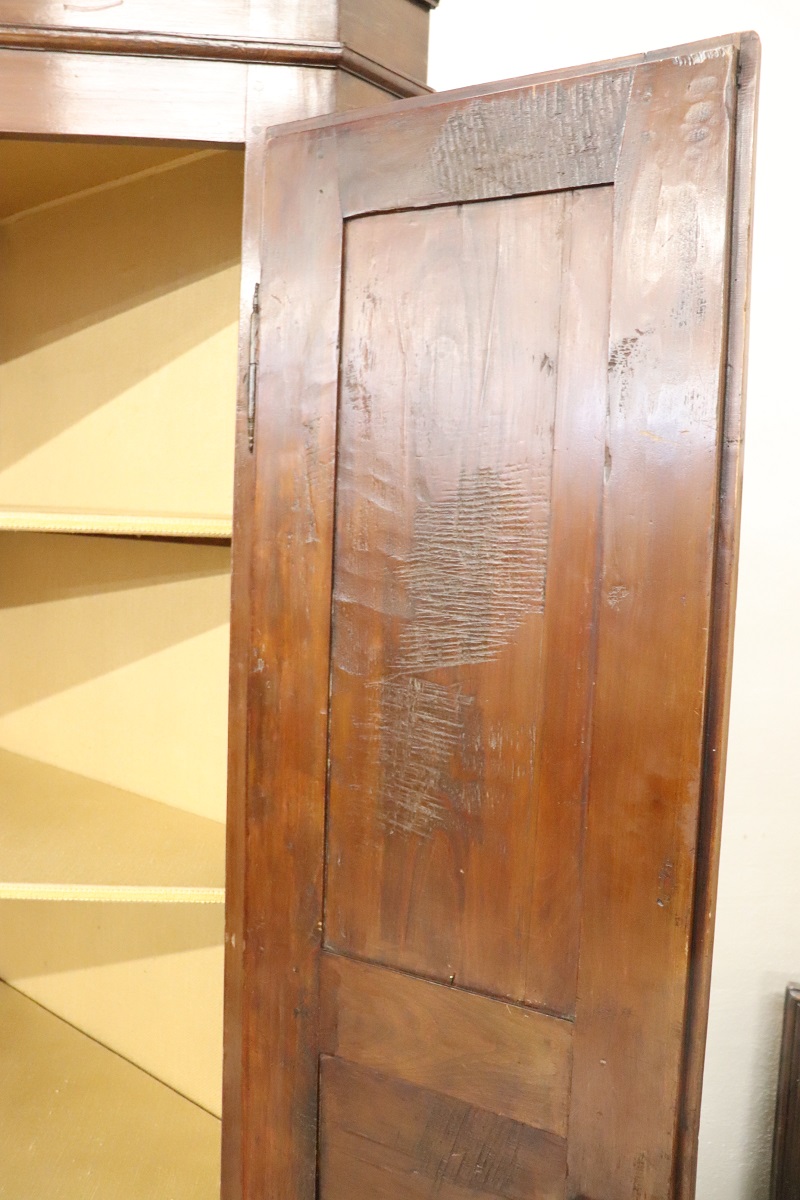 Antique solid walnut corner cabinet