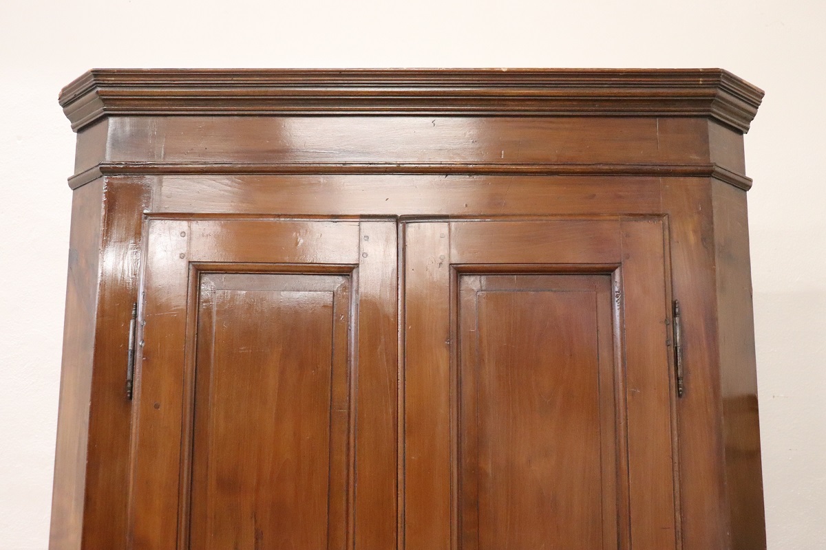 Antique solid walnut corner cabinet