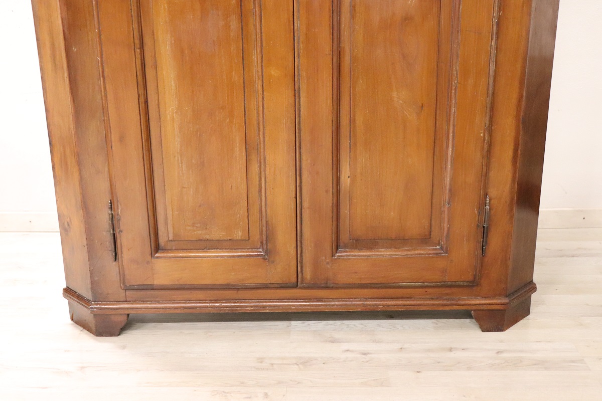 Antique solid walnut corner cabinet