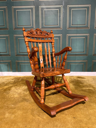 Decoratively Carved Childs Rocking Chair