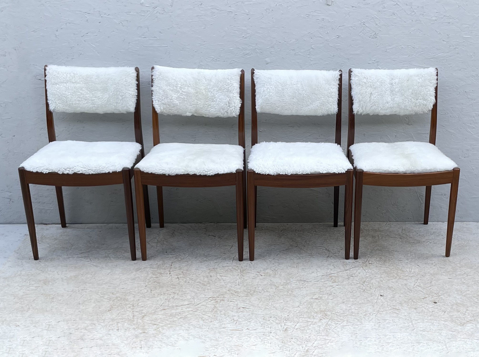 Four Mid Century Teak, Low Back, Dining Chairs, Upholstered In Natural Shearling/Sheepskin