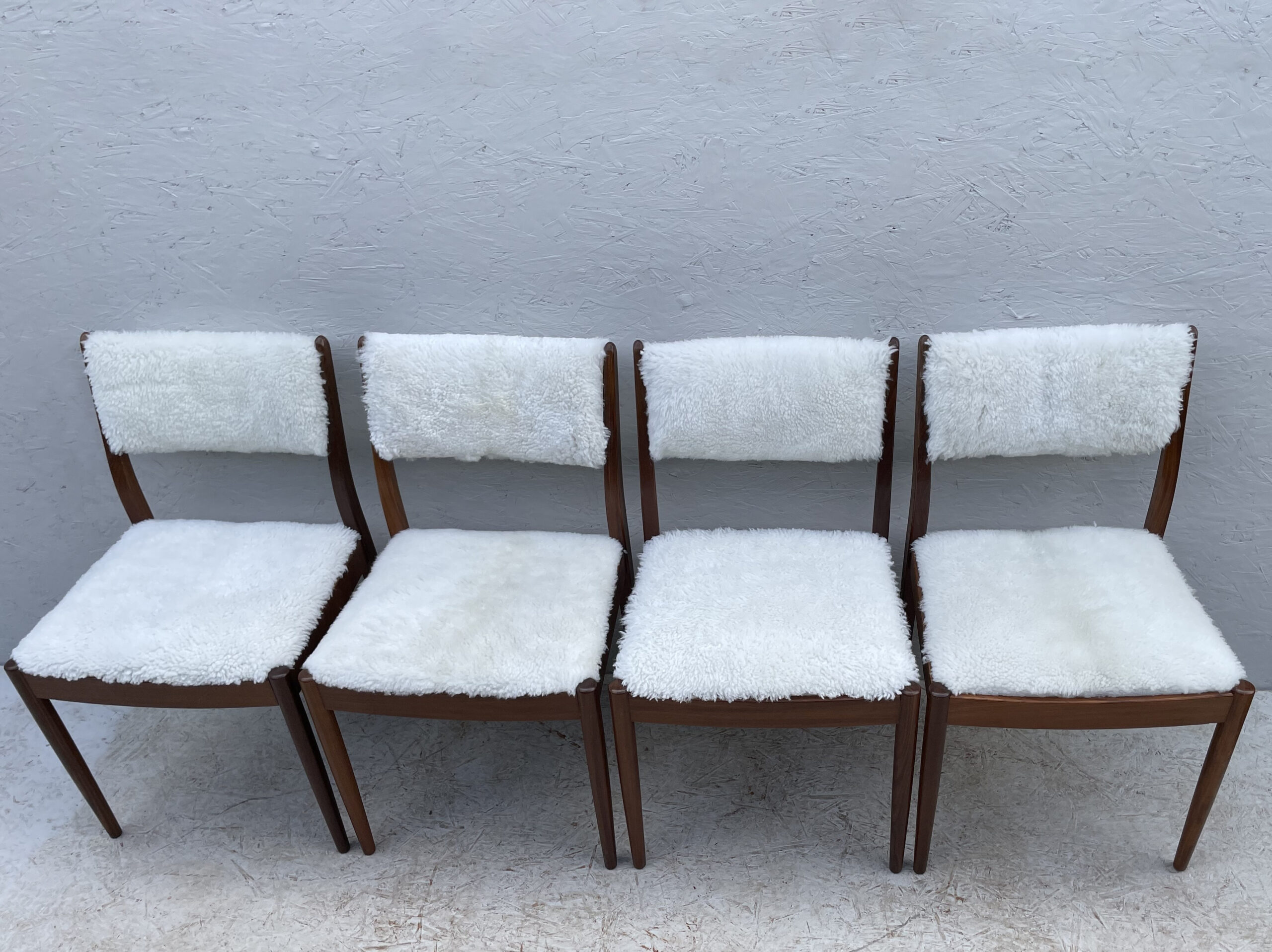 Four Mid Century Teak, Low Back, Dining Chairs, Upholstered In Natural Shearling/Sheepskin