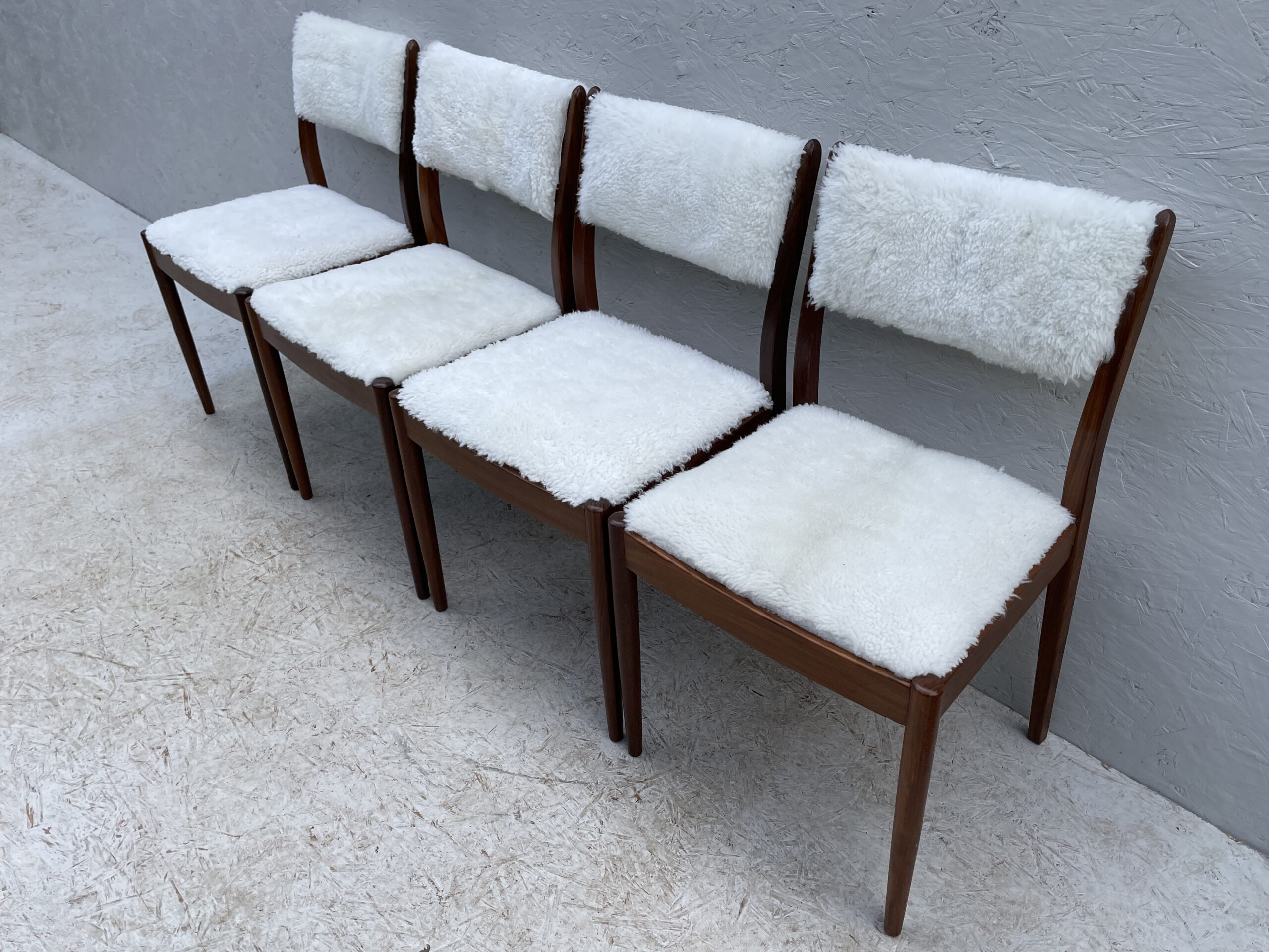 Four Mid Century Teak, Low Back, Dining Chairs, Upholstered In Natural Shearling/Sheepskin