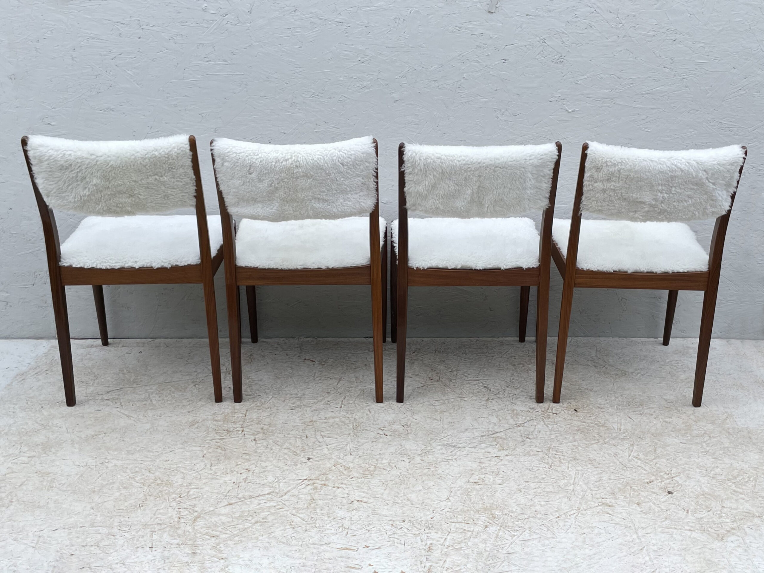 Four Mid Century Teak, Low Back, Dining Chairs, Upholstered In Natural Shearling/Sheepskin