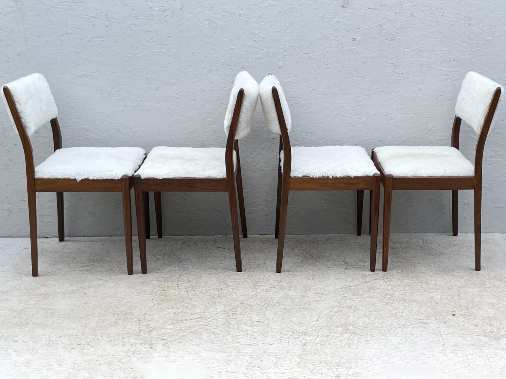 Four Mid Century Teak, Low Back, Dining Chairs, Upholstered In Natural Shearling/Sheepskin