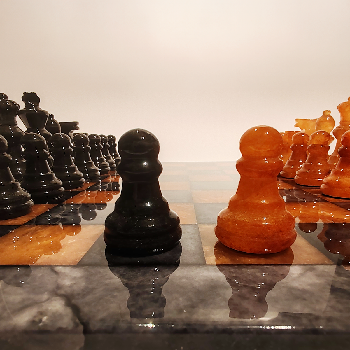 Chess Set in Hand carved Italian Alabaster of Volterra - Black and Natural Agate 1970s