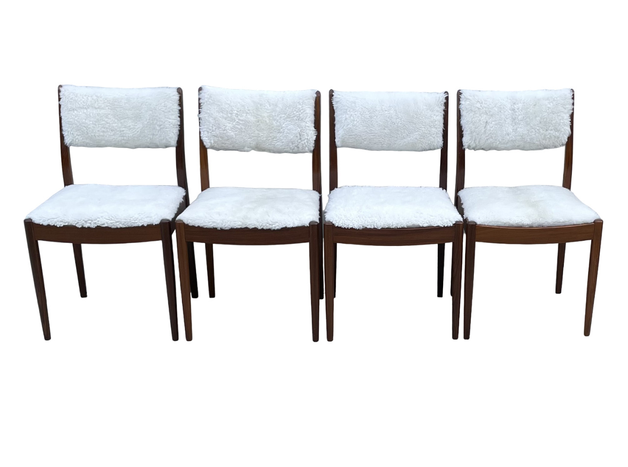 Four Mid Century Teak, Low Back, Dining Chairs, Upholstered In Natural ShearlingSheepskin