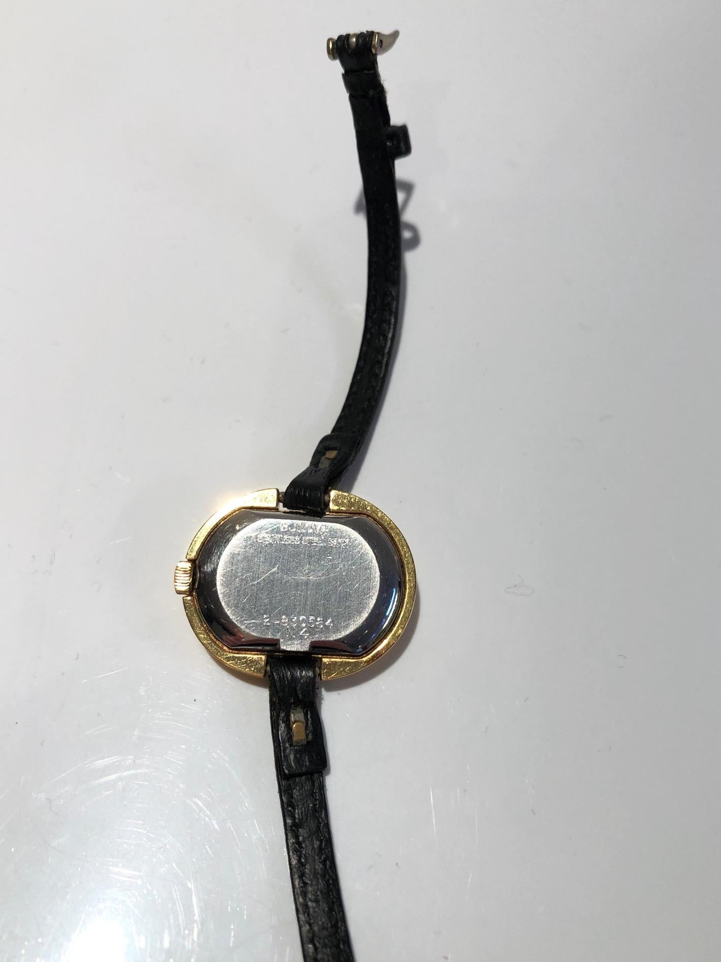 1970s Bulova for Christian Dior 14K Gold Plated Oval Green Dial Wristwatch
