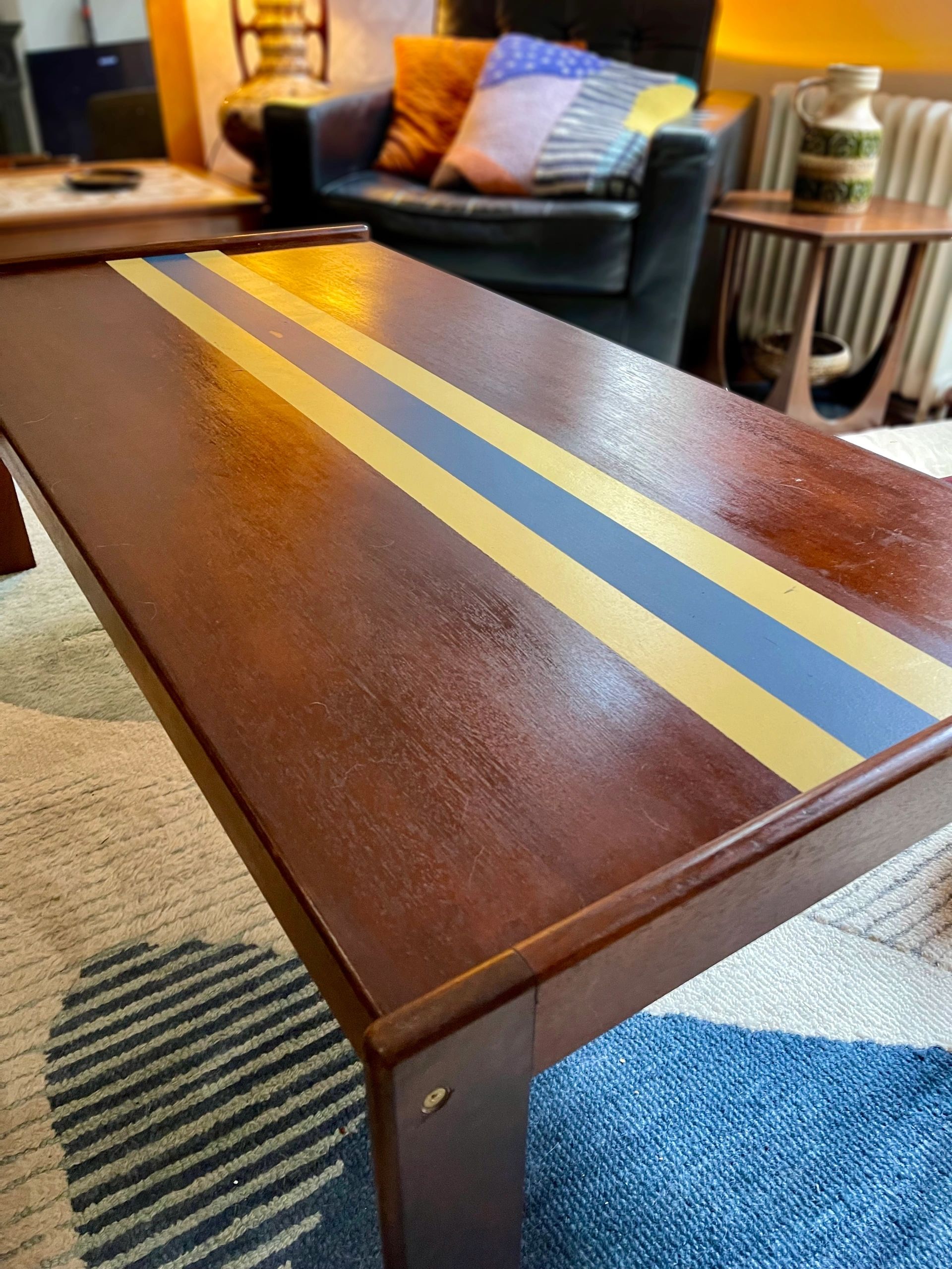 Striking and unique Danish Mid century teak coffee table with central 'team colours' stripe detail