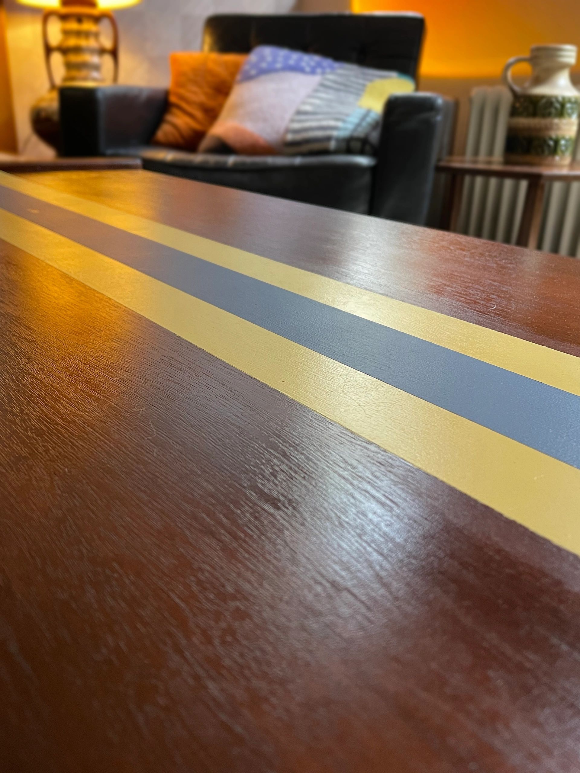 Striking and unique Danish Mid century teak coffee table with central 'team colours' stripe detail