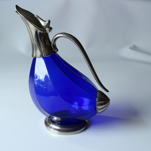 Silver plated metal and glass wine decanter in the shape of a duck, vintage from the 70s