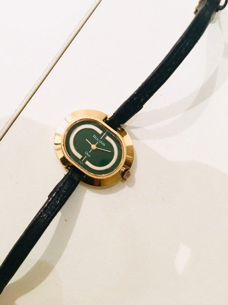 1970s Bulova for Christian Dior 14K Gold Plated Oval Green Dial Wristwatch