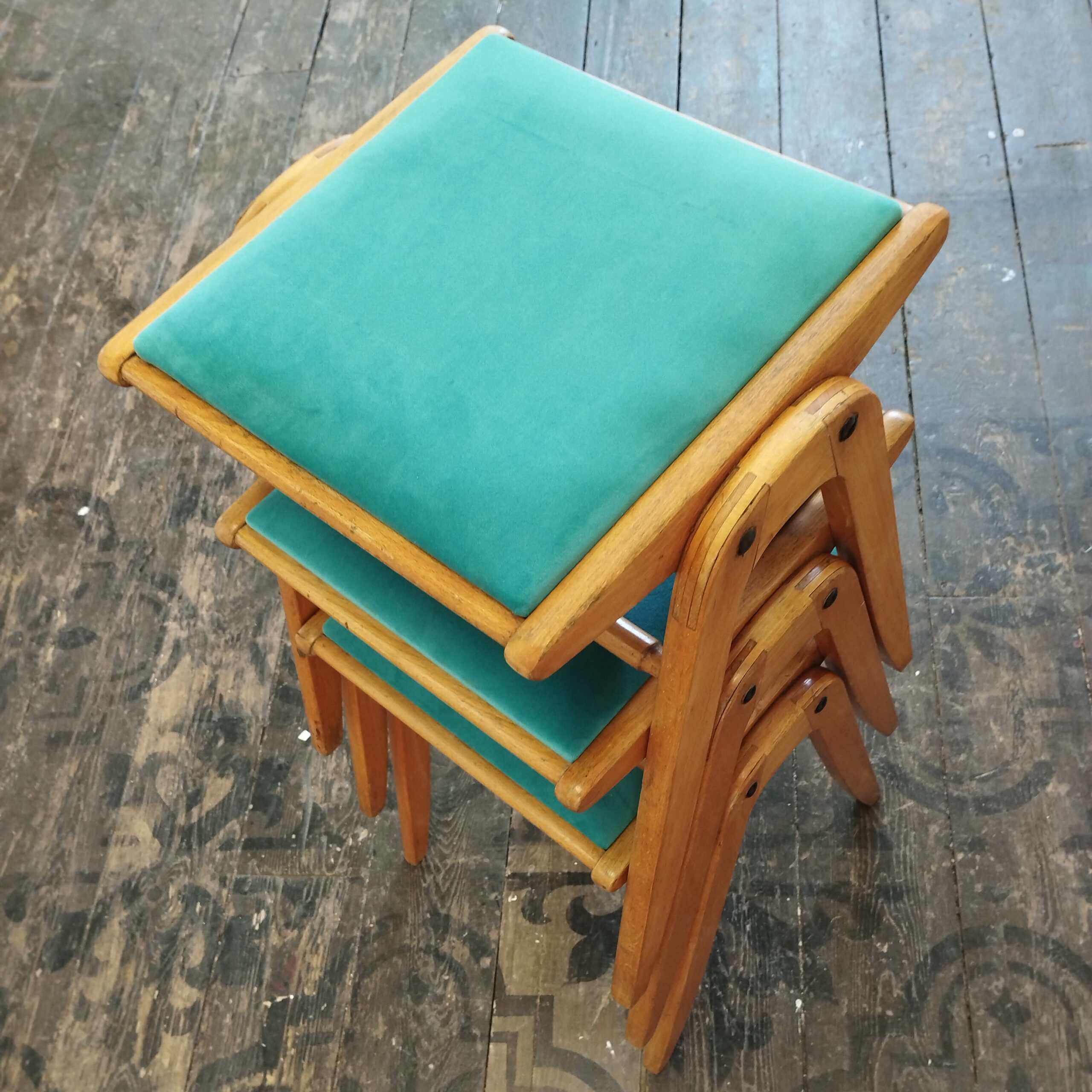 Set of three mid-century stacking stools, turquoise velvet