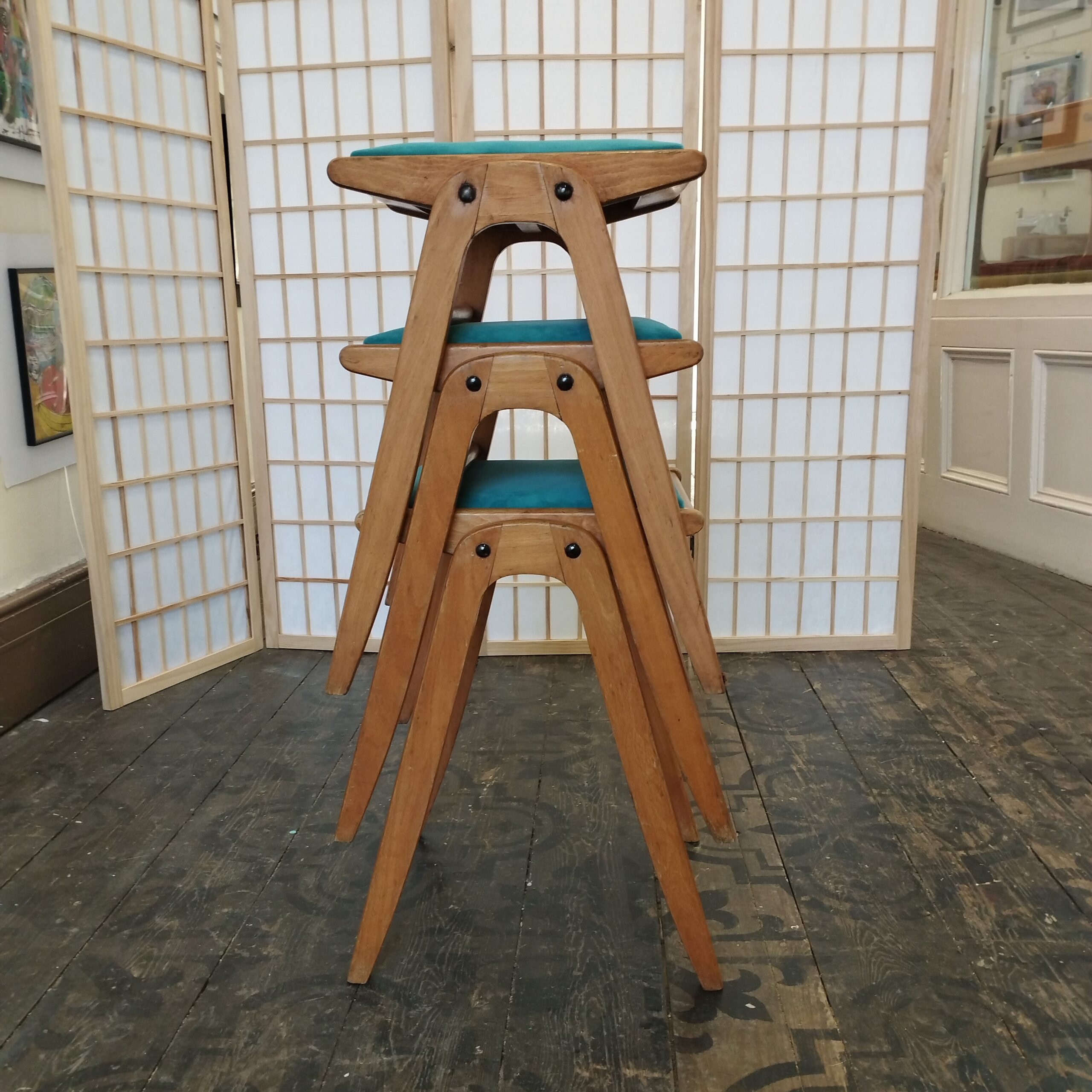 Set of three mid-century stacking stools, turquoise velvet