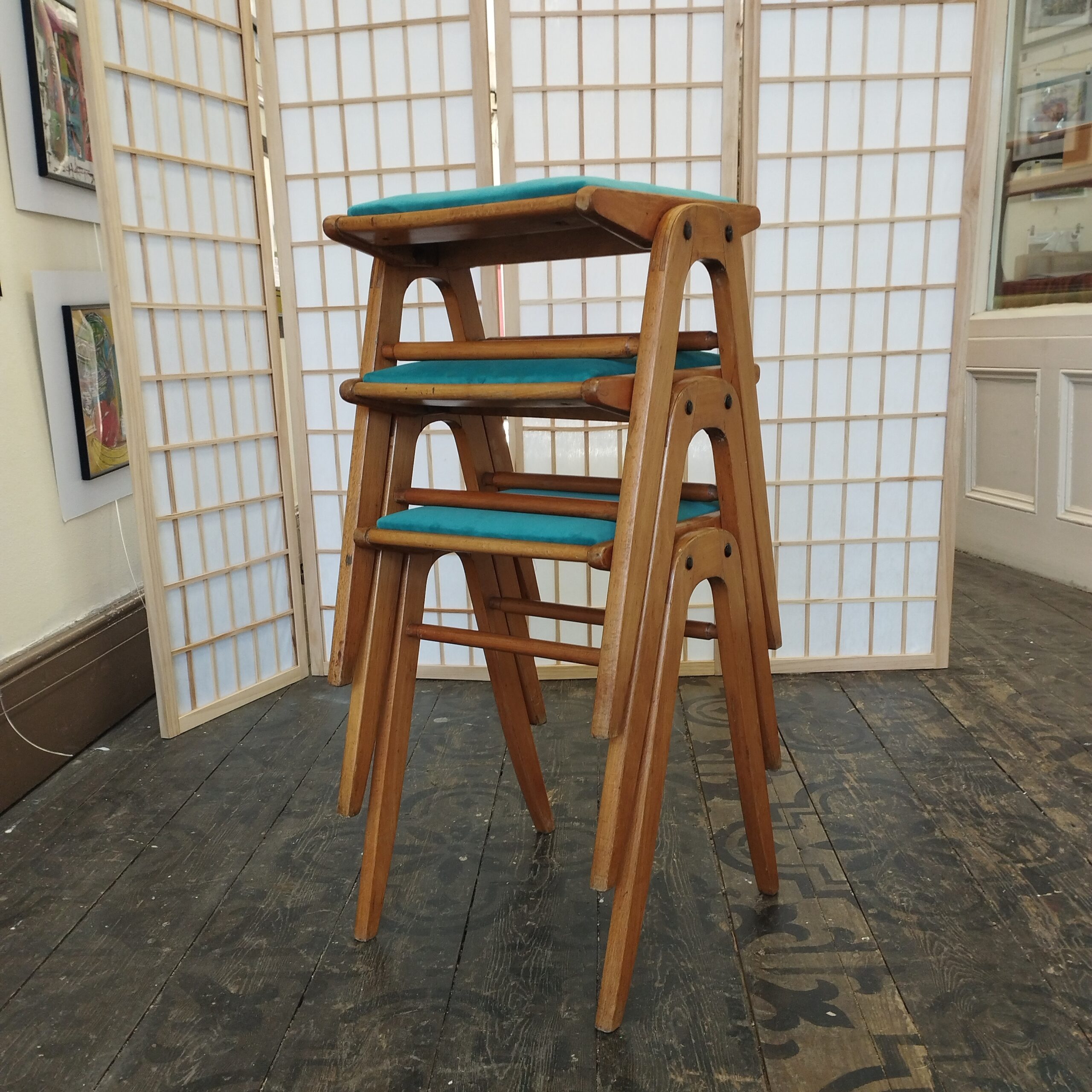 Set of three mid-century stacking stools, turquoise velvet