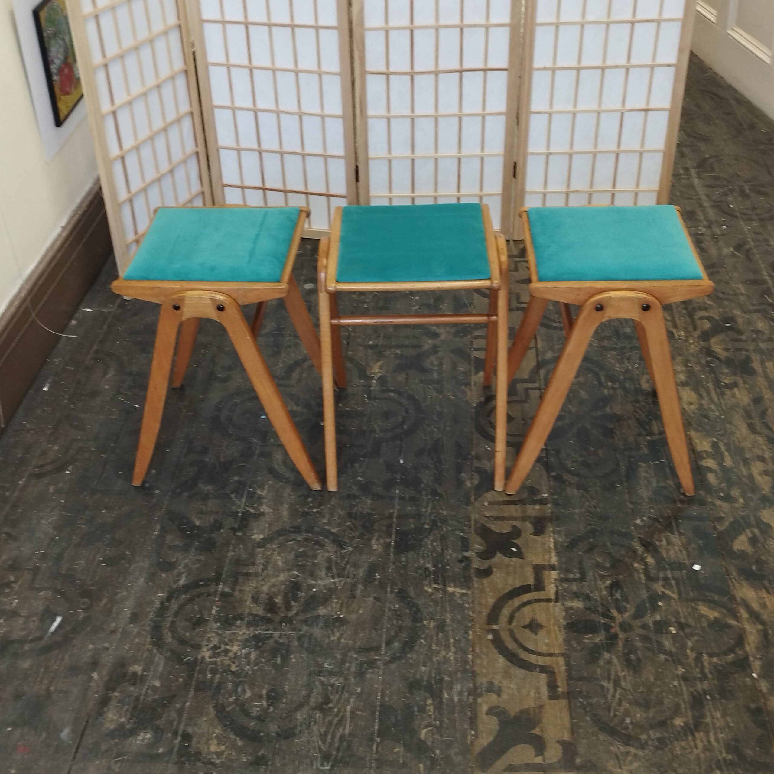 Set of three mid-century stacking stools, turquoise velvet