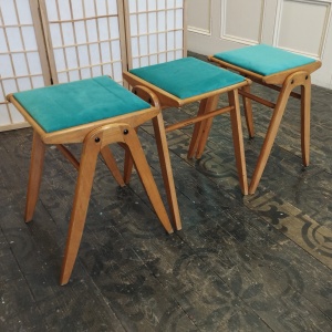 Set of three mid-century stacking stools, turquoise velvet