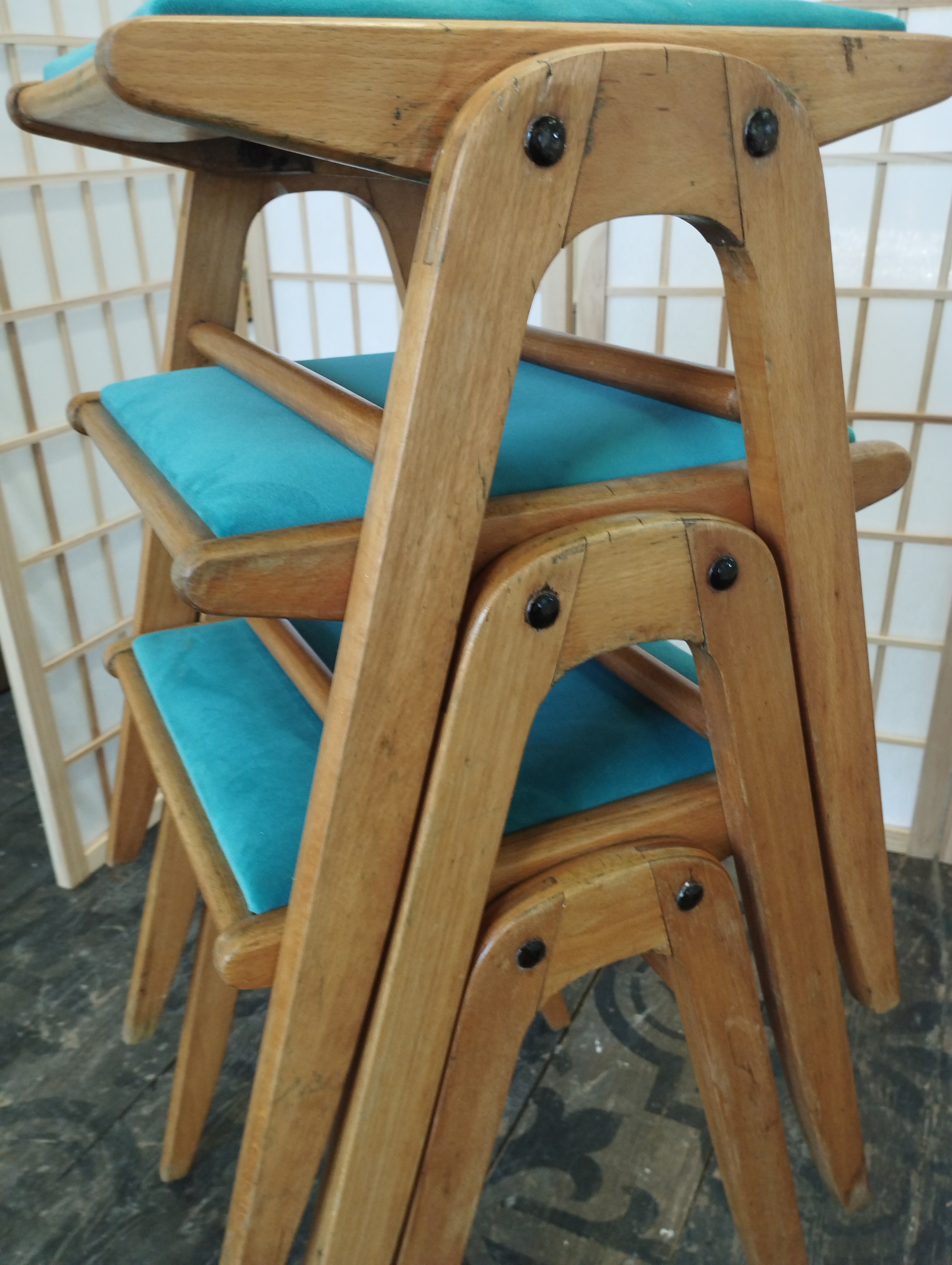 Set of three mid-century stacking stools, turquoise velvet