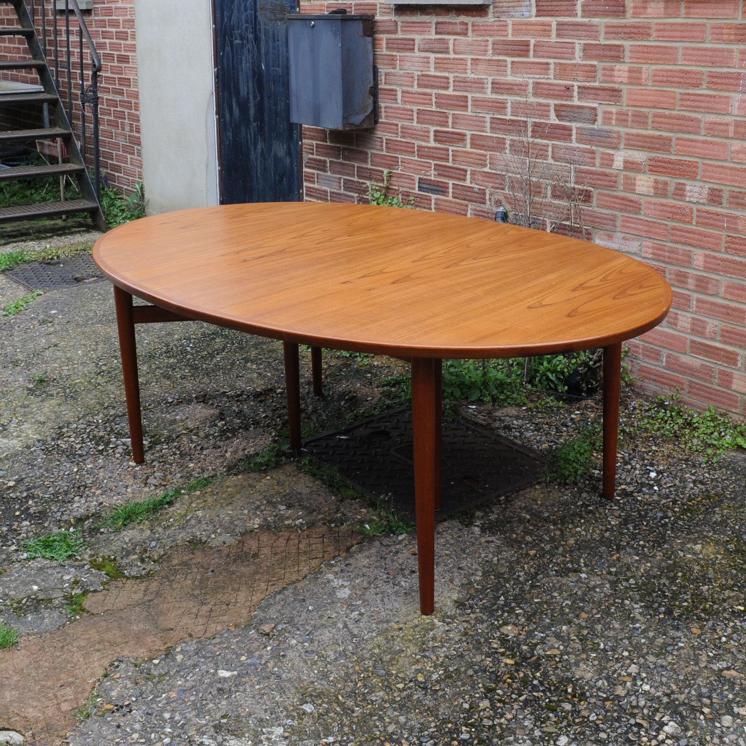 Mid Century Danish Model 212 Extending Oval Dining Table In Teak By Arne Vodder For Sibast Møbler, 1960s