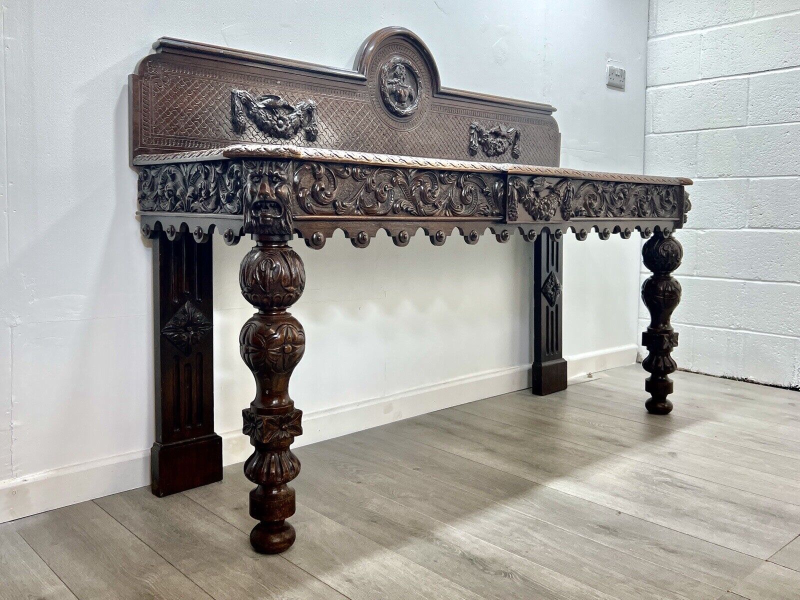A Large Elizabethan Revival, Lion Mask Carved Console / Serving Table