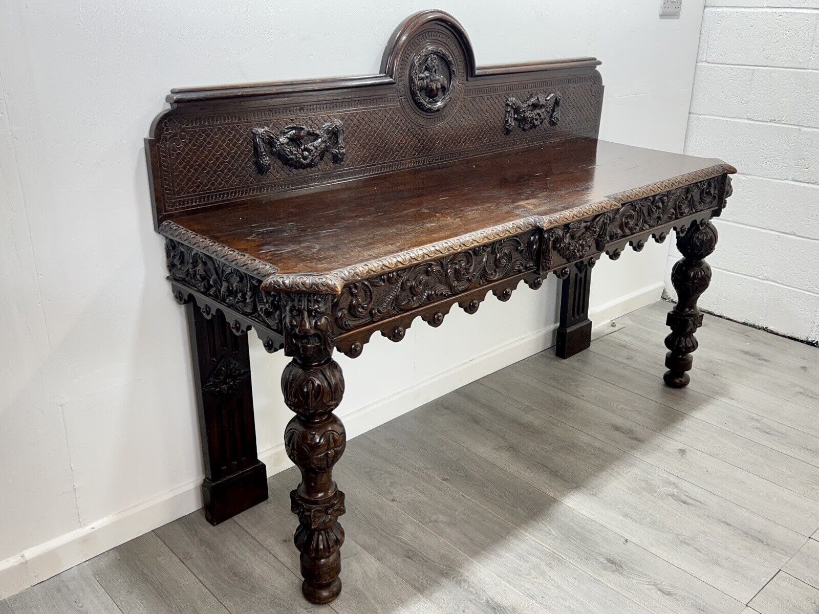 A Large Elizabethan Revival, Lion Mask Carved Console / Serving Table