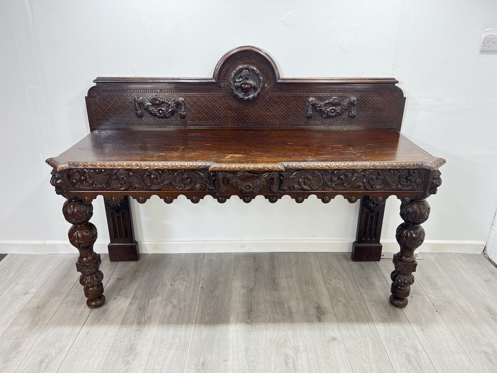 A Large Elizabethan Revival, Lion Mask Carved Console / Serving Table
