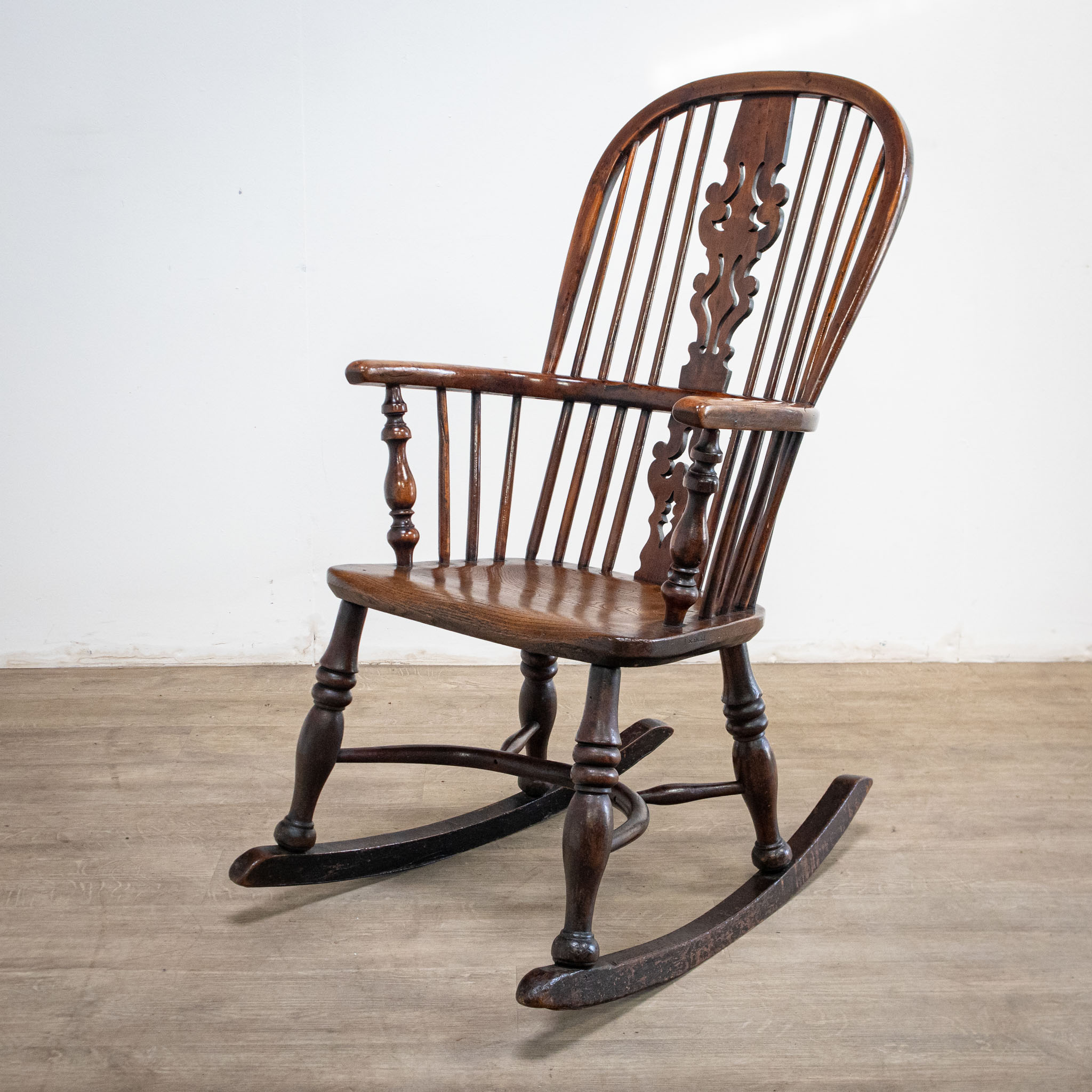 19th Century Yew Rocking Chair by J. Spencer