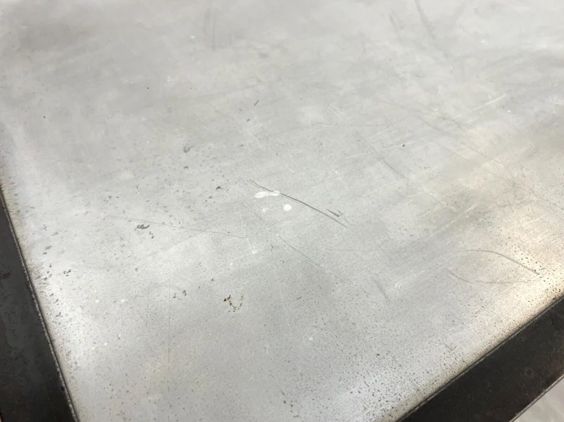 A Bespoke Industrial Aluminium and Iron Dining Table