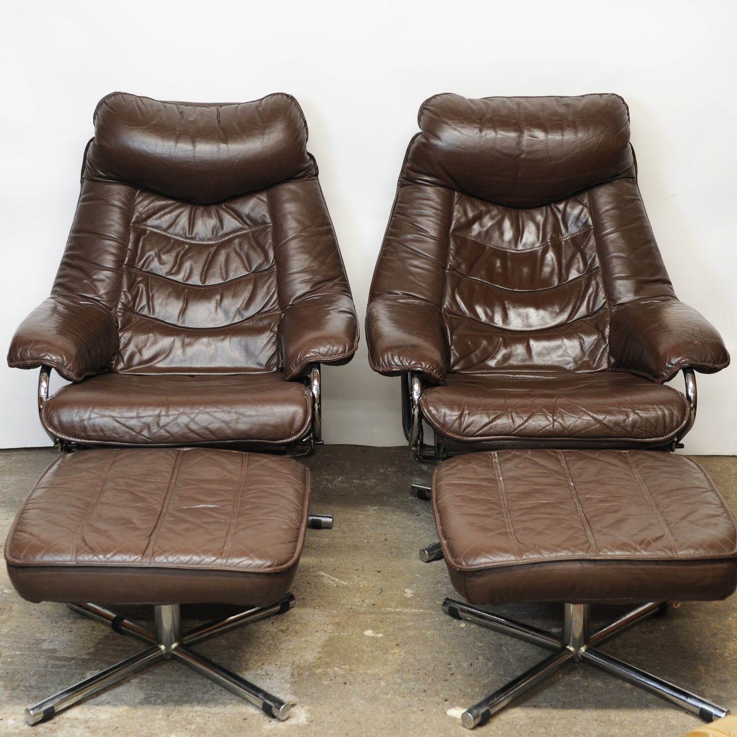 Pair of Norwegian Lounge Chairs with Footstools in Brown Leather by Skoghaus Industri, 1960s, Set of 2