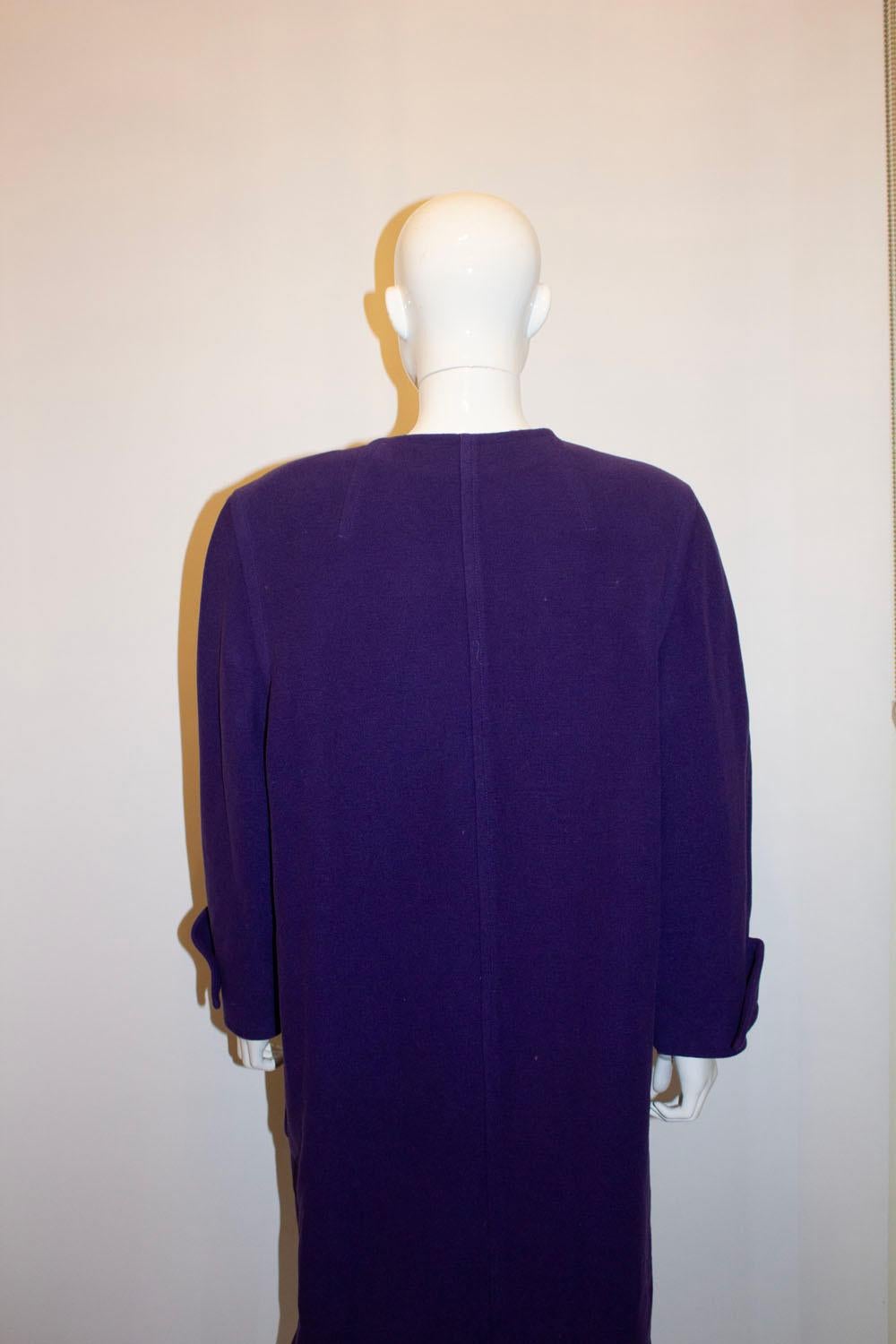 A statement vintage purple coat by Courreges