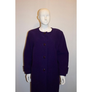 A statement vintage purple coat by Courreges