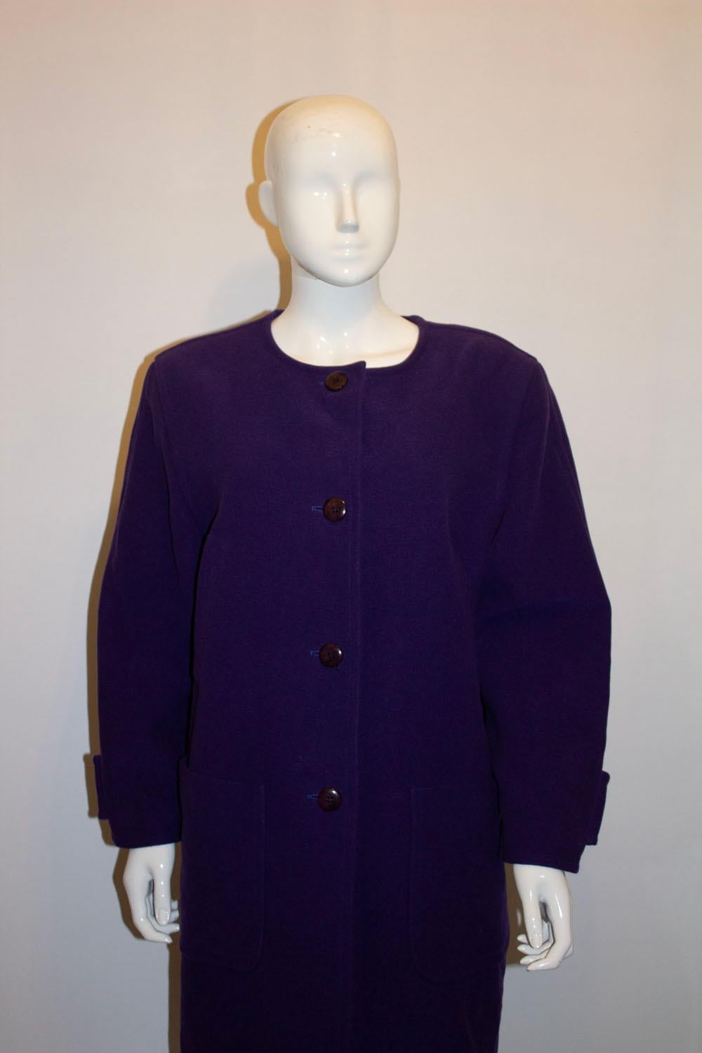 A statement vintage purple coat by Courreges