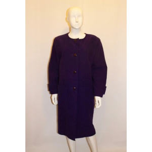 A statement vintage purple coat by Courreges