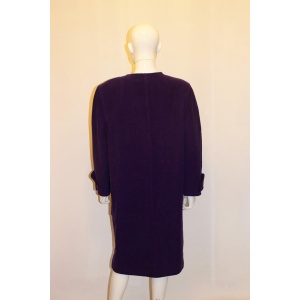 A statement vintage purple coat by Courreges