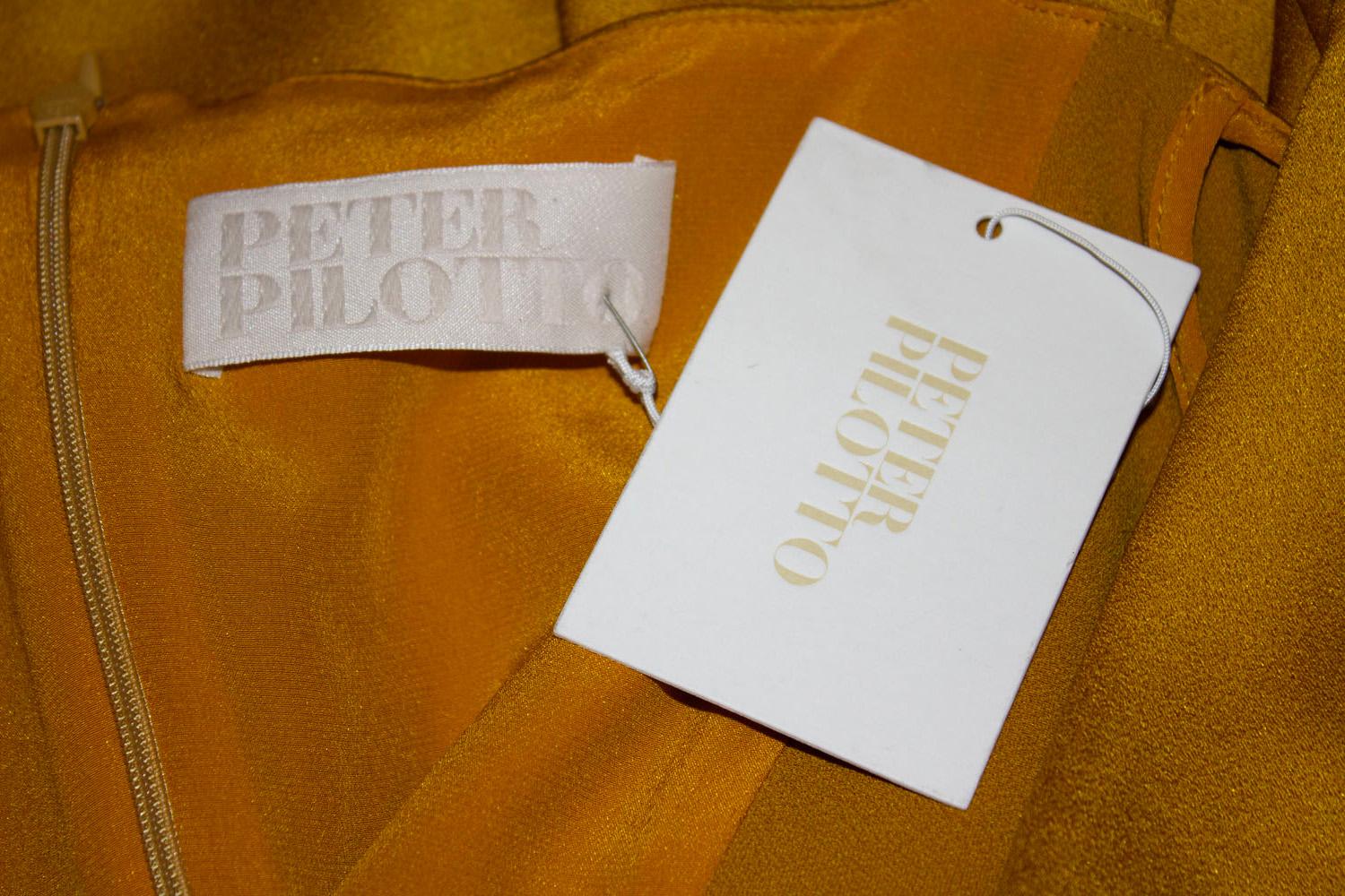 Peter Pillotto Gold top with cutaway shoulders