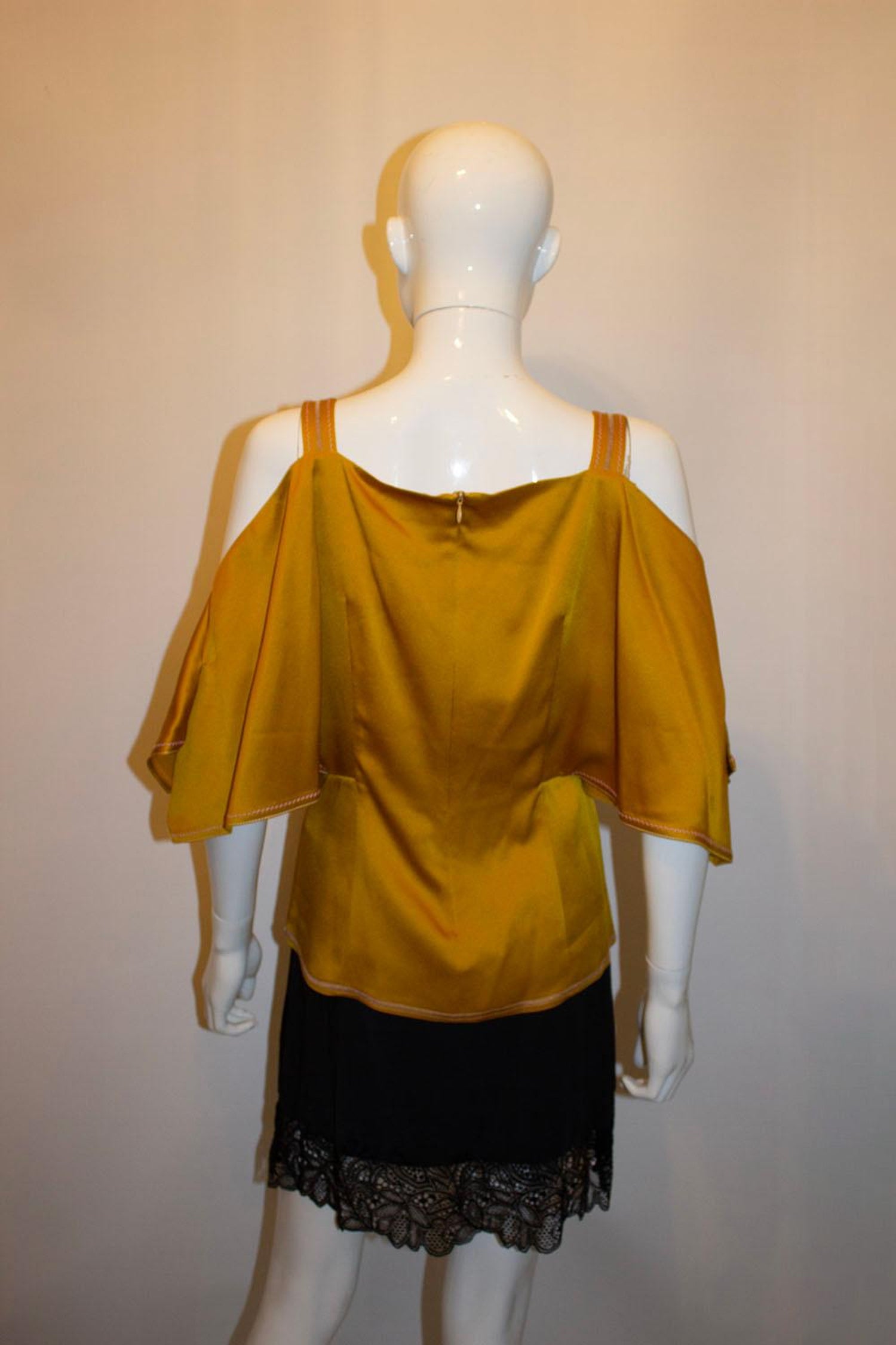Peter Pillotto Gold top with cutaway shoulders