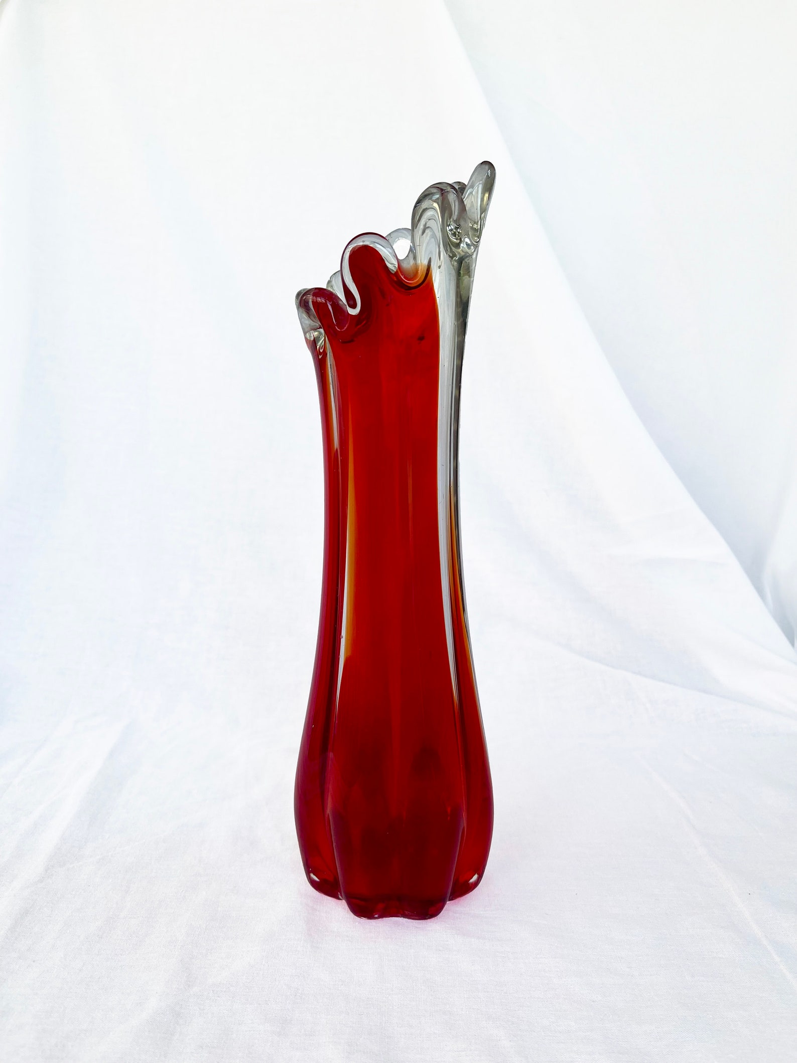 Mid century Vintage large swung glass vase in vibrant retro orange and hot red tones circa 1970's