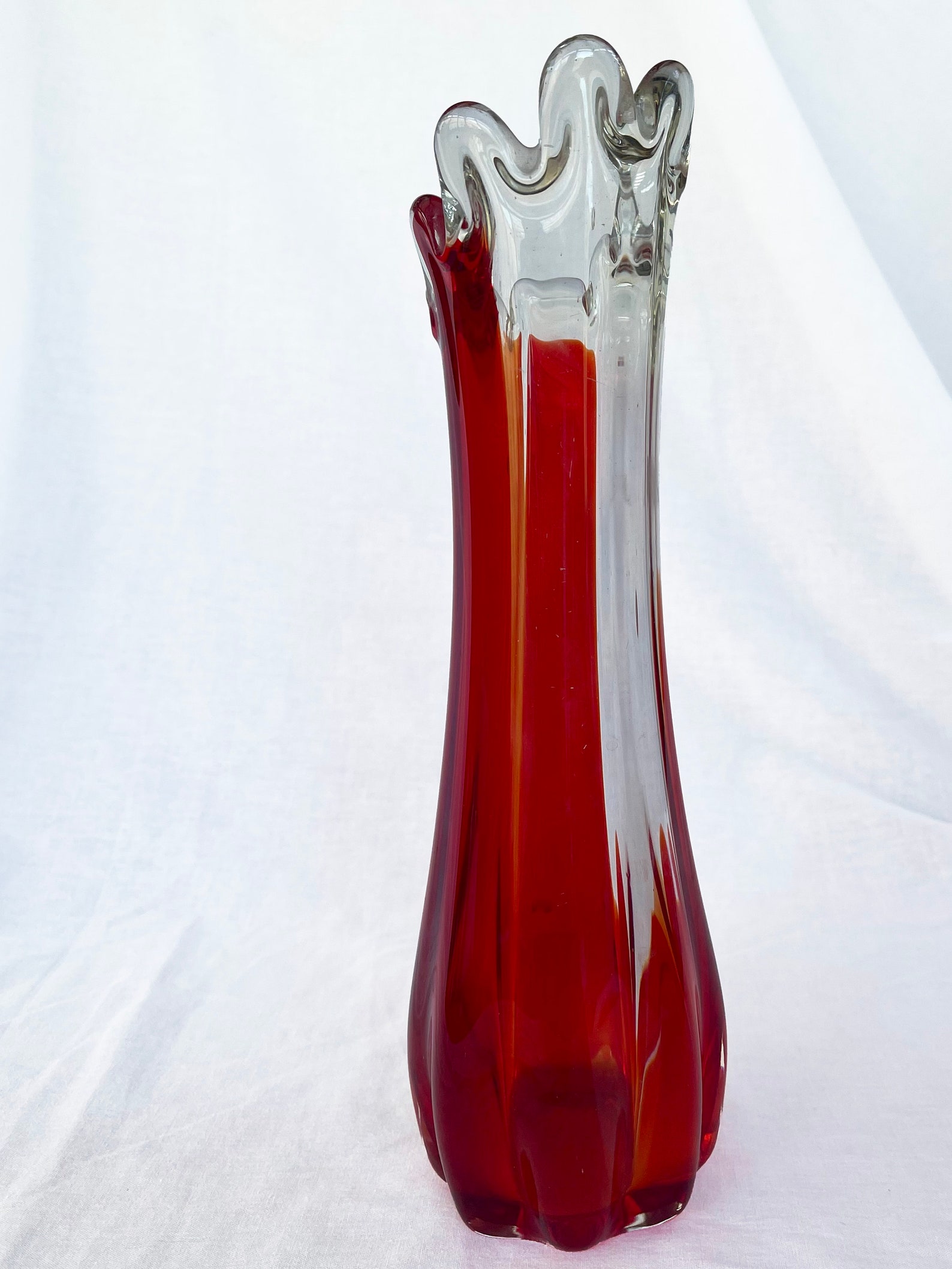 Mid century Vintage large swung glass vase in vibrant retro orange and hot red tones circa 1970's