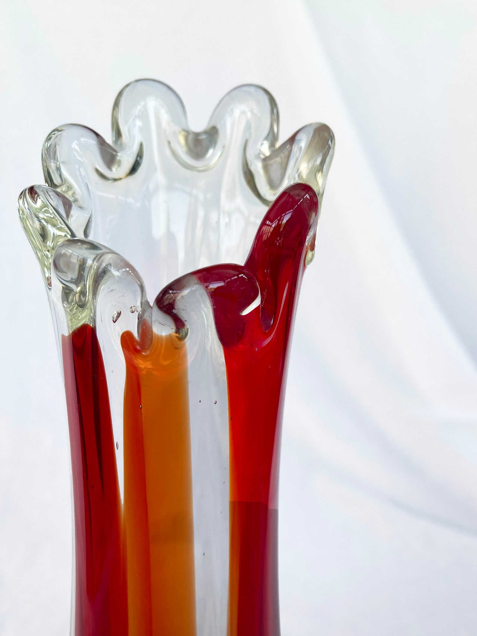 Mid century Vintage large swung glass vase in vibrant retro orange and hot red tones circa 1970's