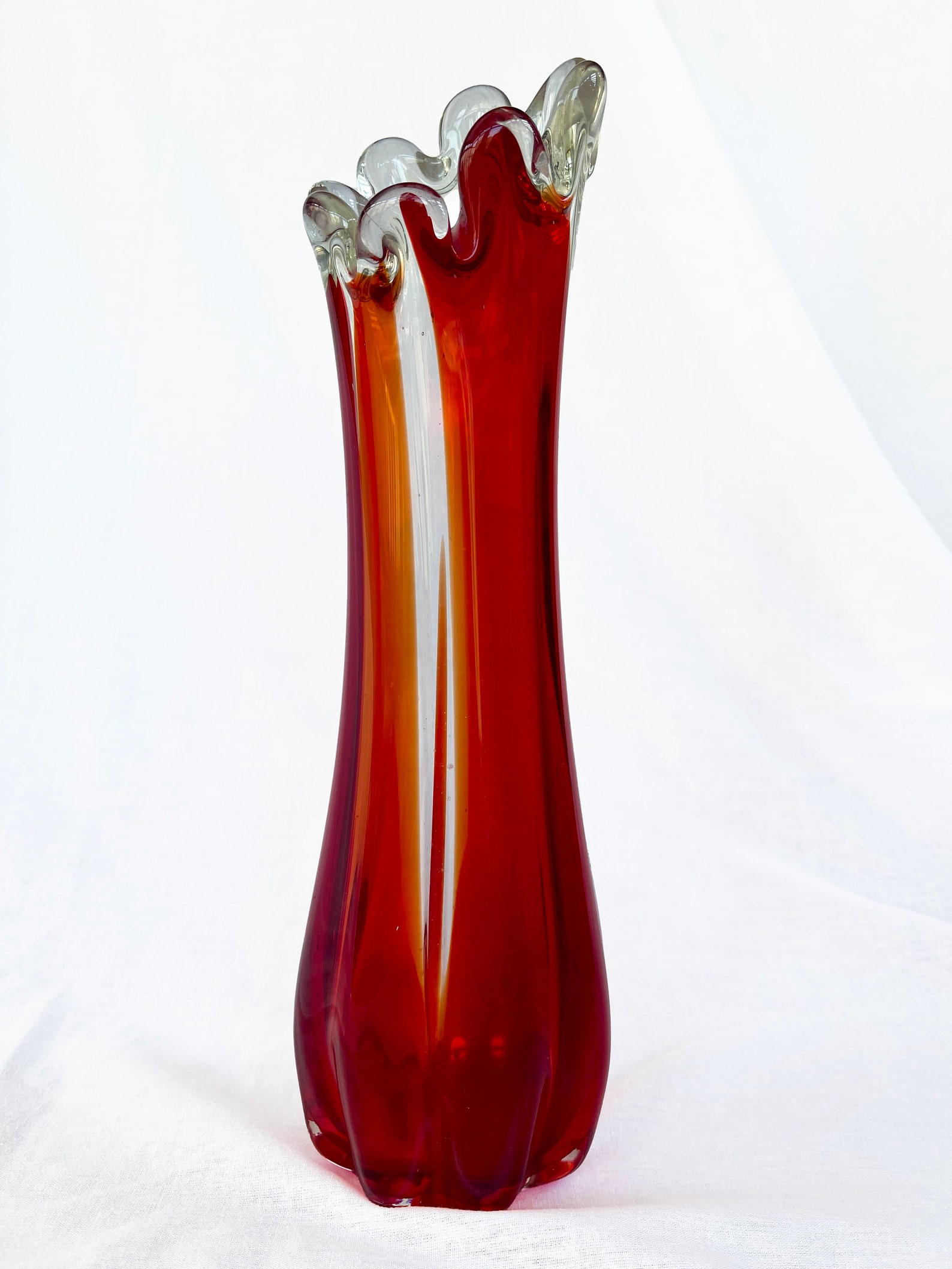 Mid century Vintage large swung glass vase in vibrant retro orange and hot red tones circa 1970's