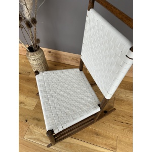 Arts and Crafts Shaker style oak rocking chair with a woven white cotton seat