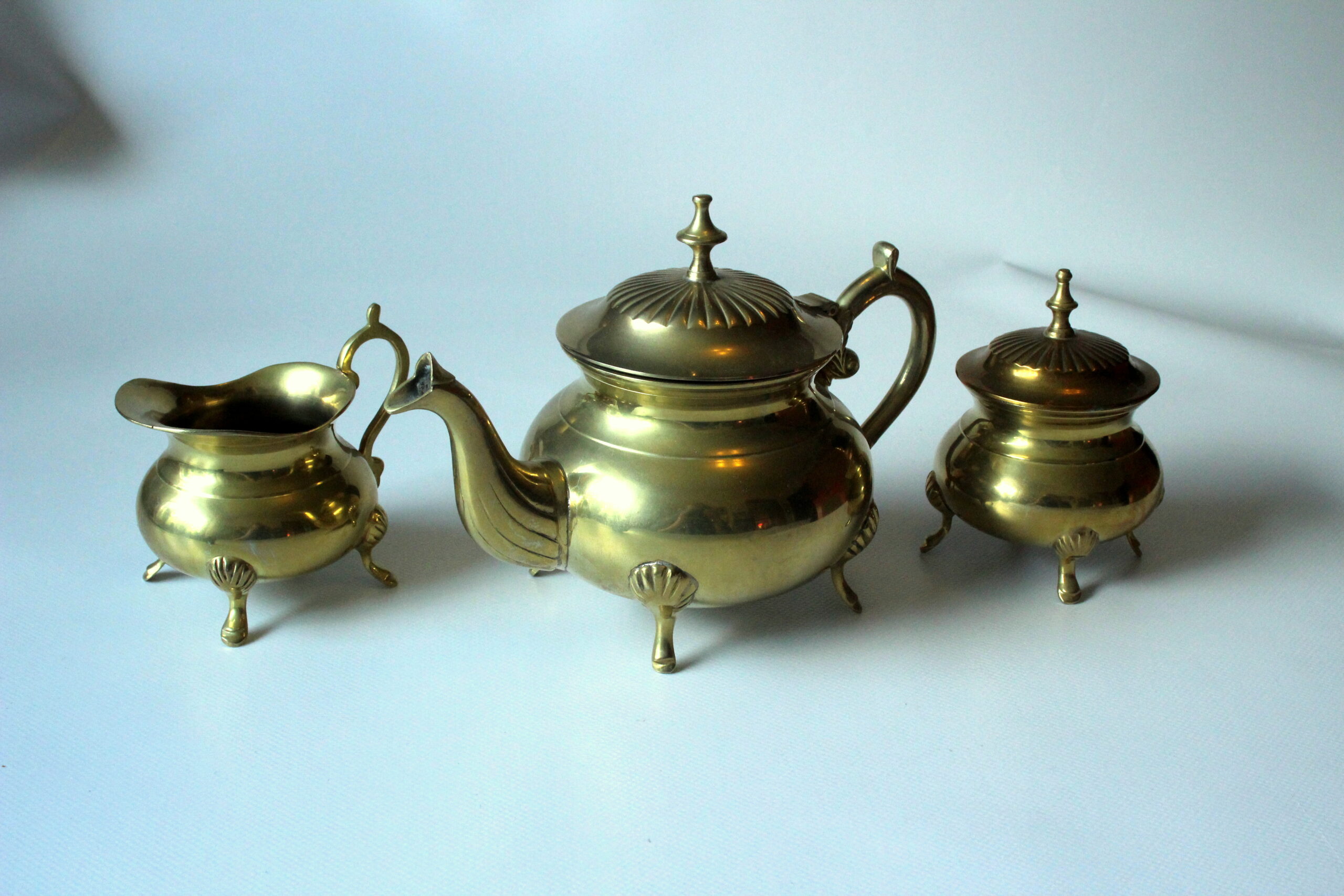 Metal teapot gold plated, inside silver plated, with milk pot and sugar bowl as a set, vintage from the 70s