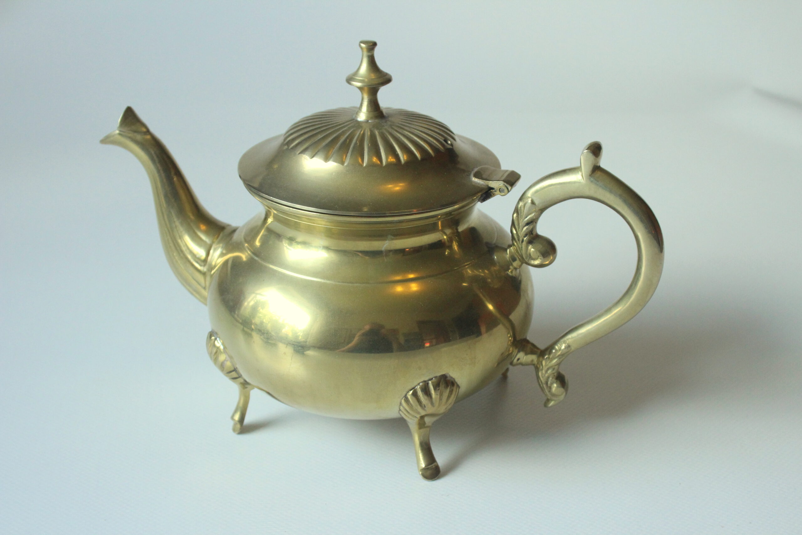 Metal teapot gold plated, inside silver plated, with milk pot and sugar bowl as a set, vintage from the 70s