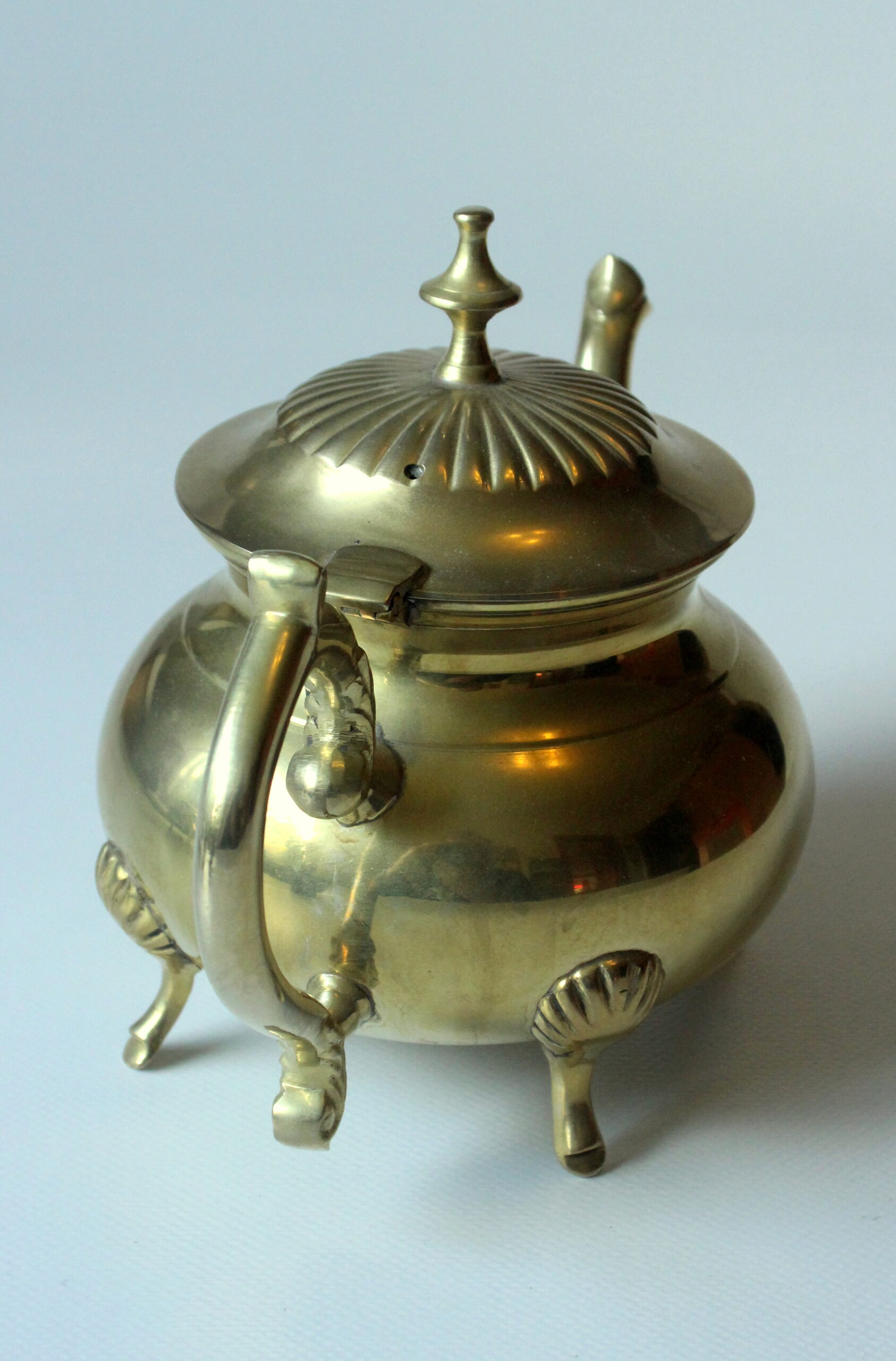 Metal teapot gold plated, inside silver plated, with milk pot and sugar bowl as a set, vintage from the 70s
