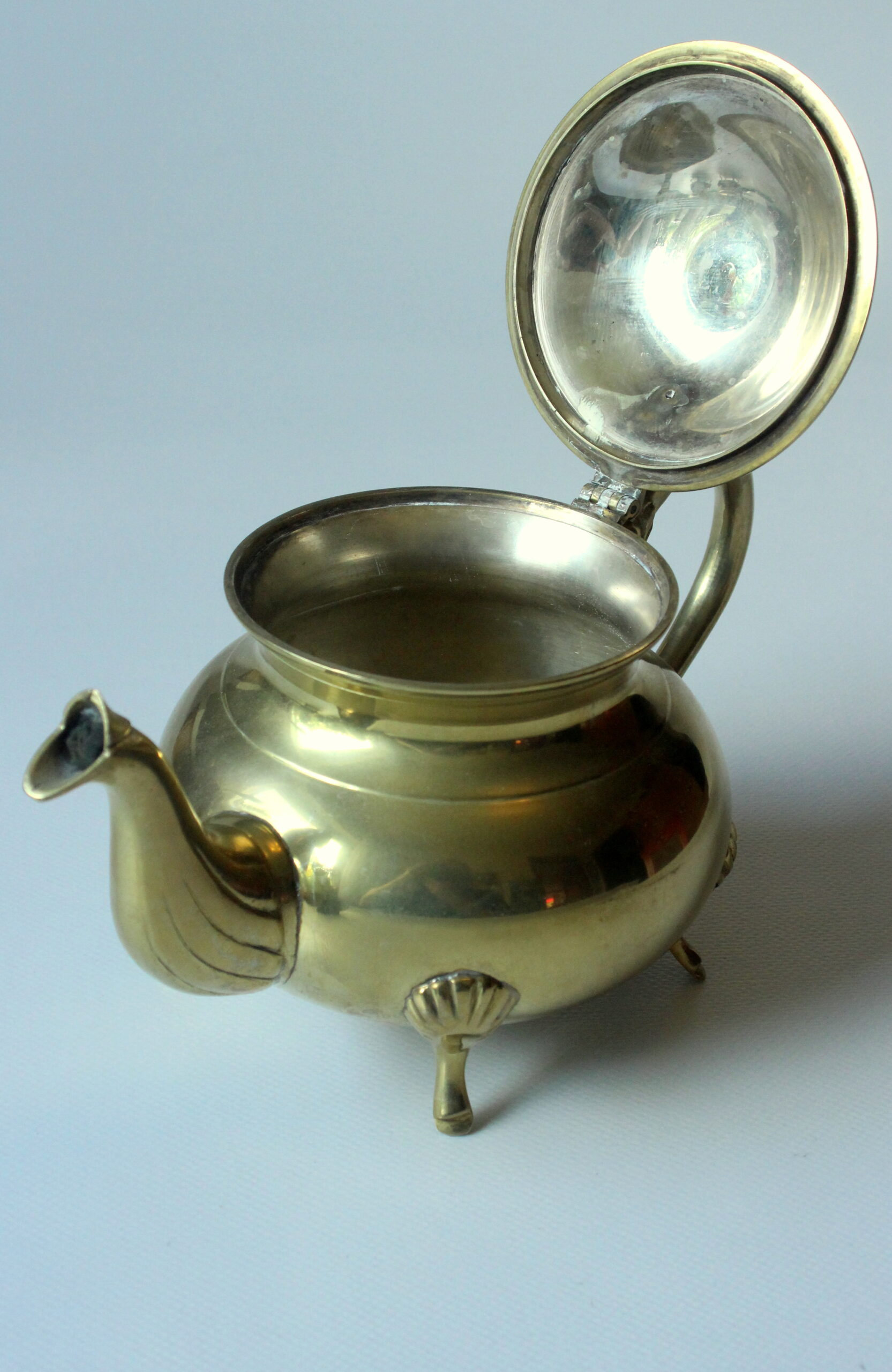 Metal teapot gold plated, inside silver plated, with milk pot and sugar bowl as a set, vintage from the 70s