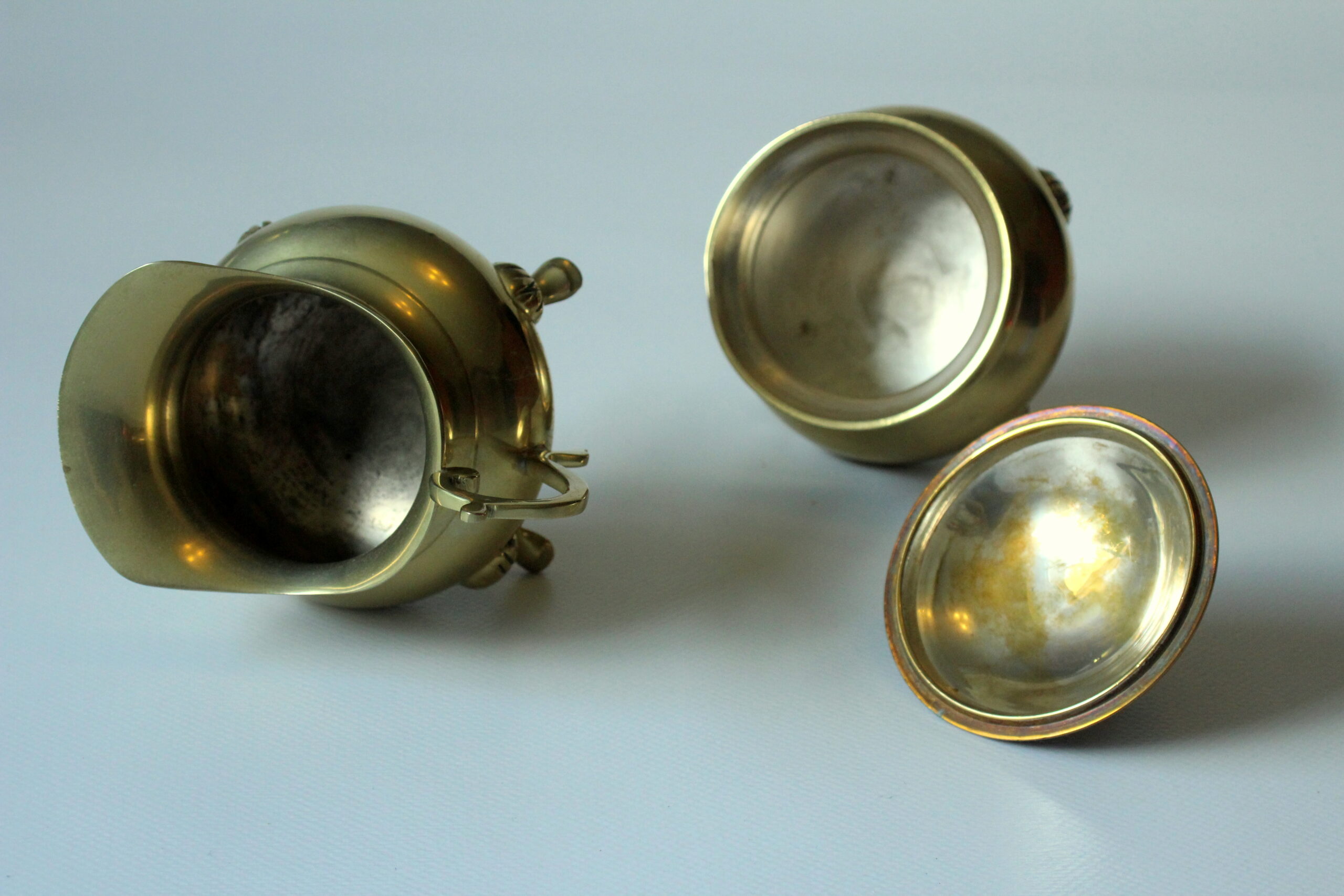 Metal teapot gold plated, inside silver plated, with milk pot and sugar bowl as a set, vintage from the 70s