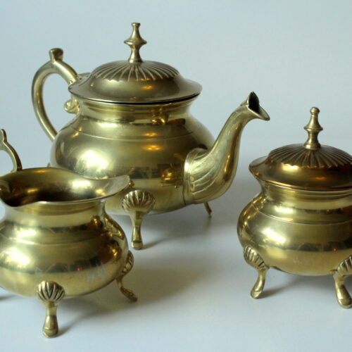 Metal teapot gold plated, inside silver plated, with milk pot and sugar bowl as a set, vintage from the 70s
