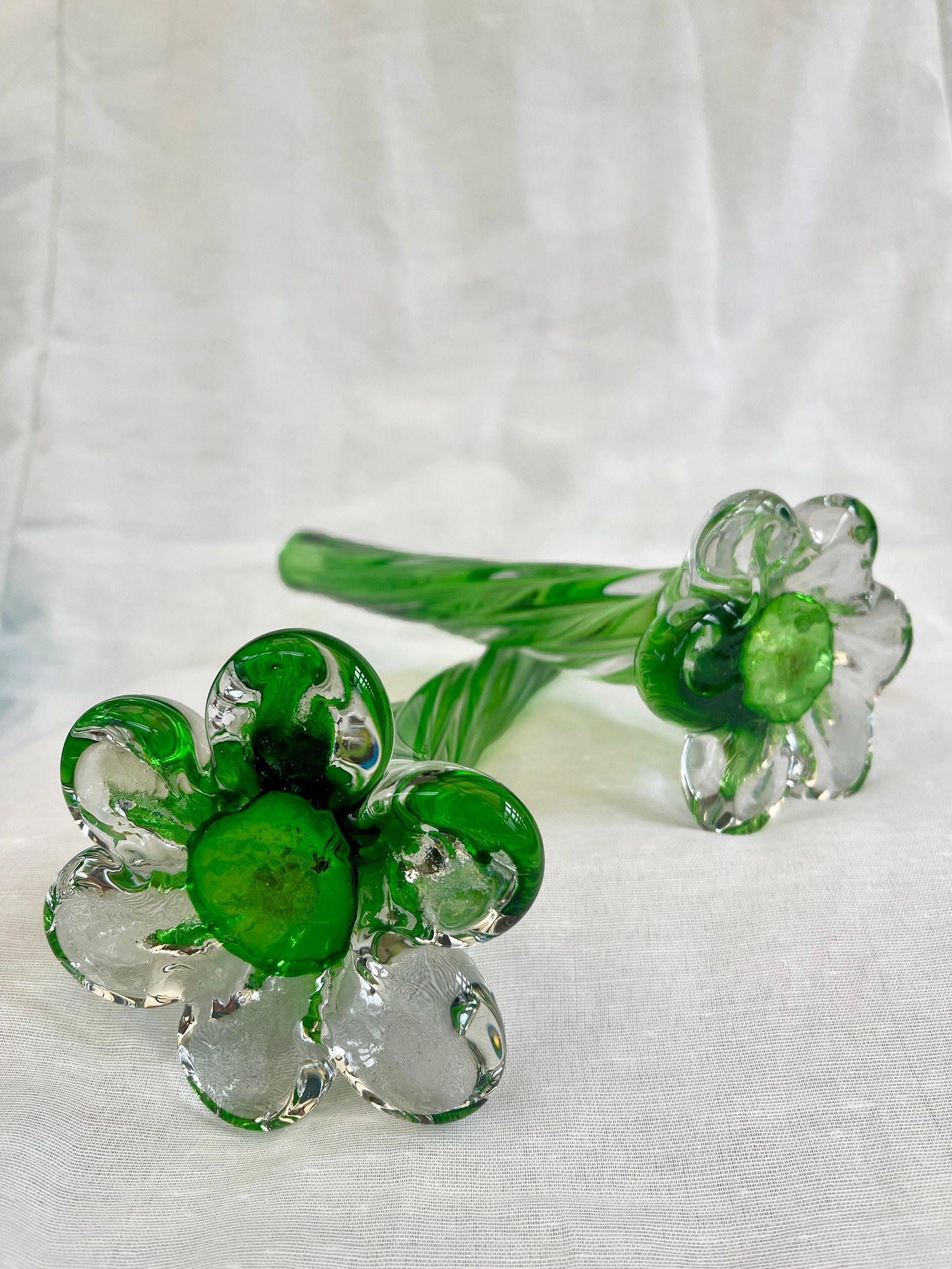 A pair of Uranium green French vintage twist stem vases. Art glass flower sleeves, circa 1950.
